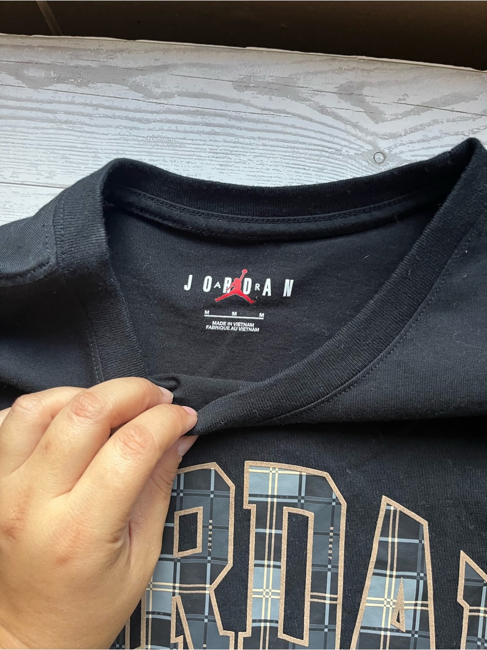 Jordan Black Short Sleeve Graphic Tee with Plaid Lettering